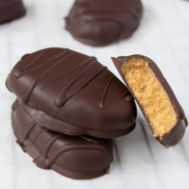 A cut open chocolate peanut butter egg.