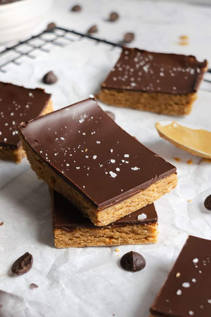 chocolate peanut butter protein bars with flaked sea salt.