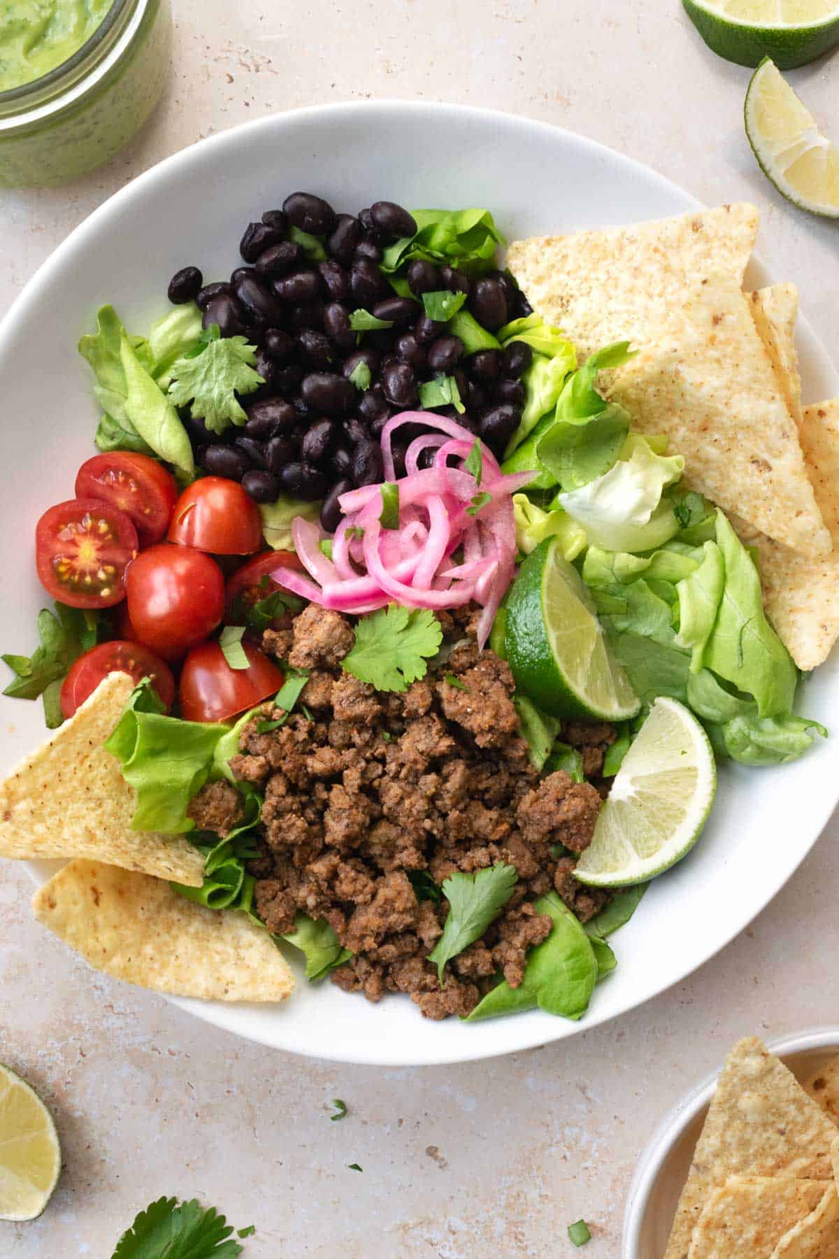 Beef Taco Salad with Avocado Cilantro Dressing - Emily Maude Nutrition