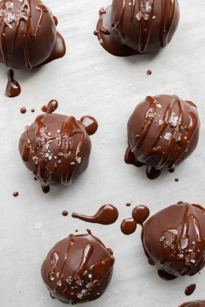 tahini miso cookie dough after being coated with melted chocolate.