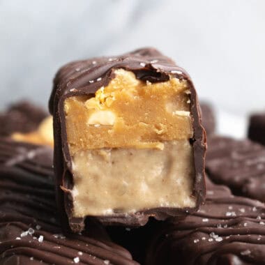 a cut open protein snickers ice cream bar.