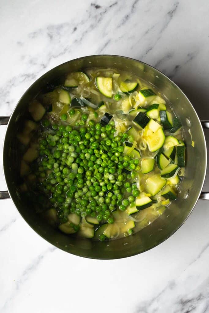 green peas added to the soup mixture.