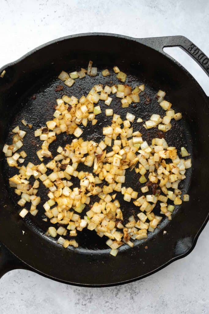 sautéed onion in a cast iron skillet.