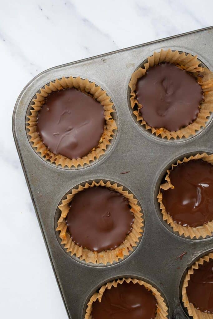 crunch cups topped with melted chocolate.